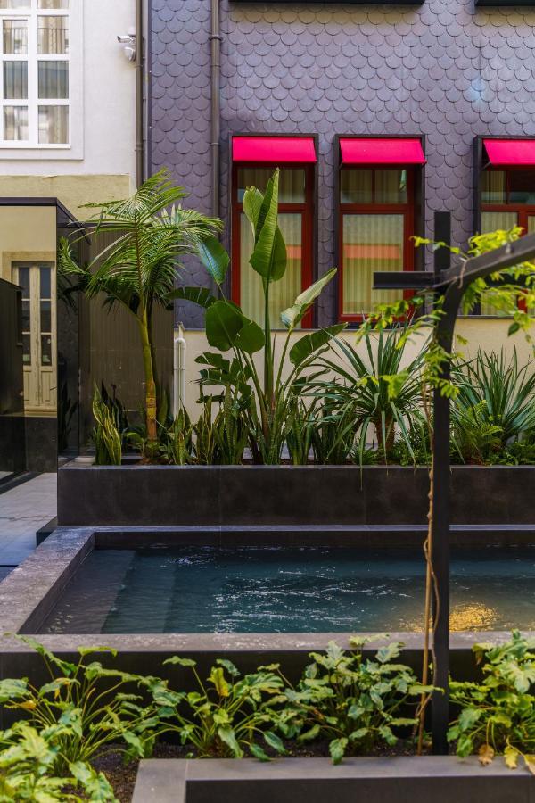 פורטו The Editory Boulevard Aliados Hotel - Preferred Hotels מראה חיצוני תמונה The courtyard of the hotel