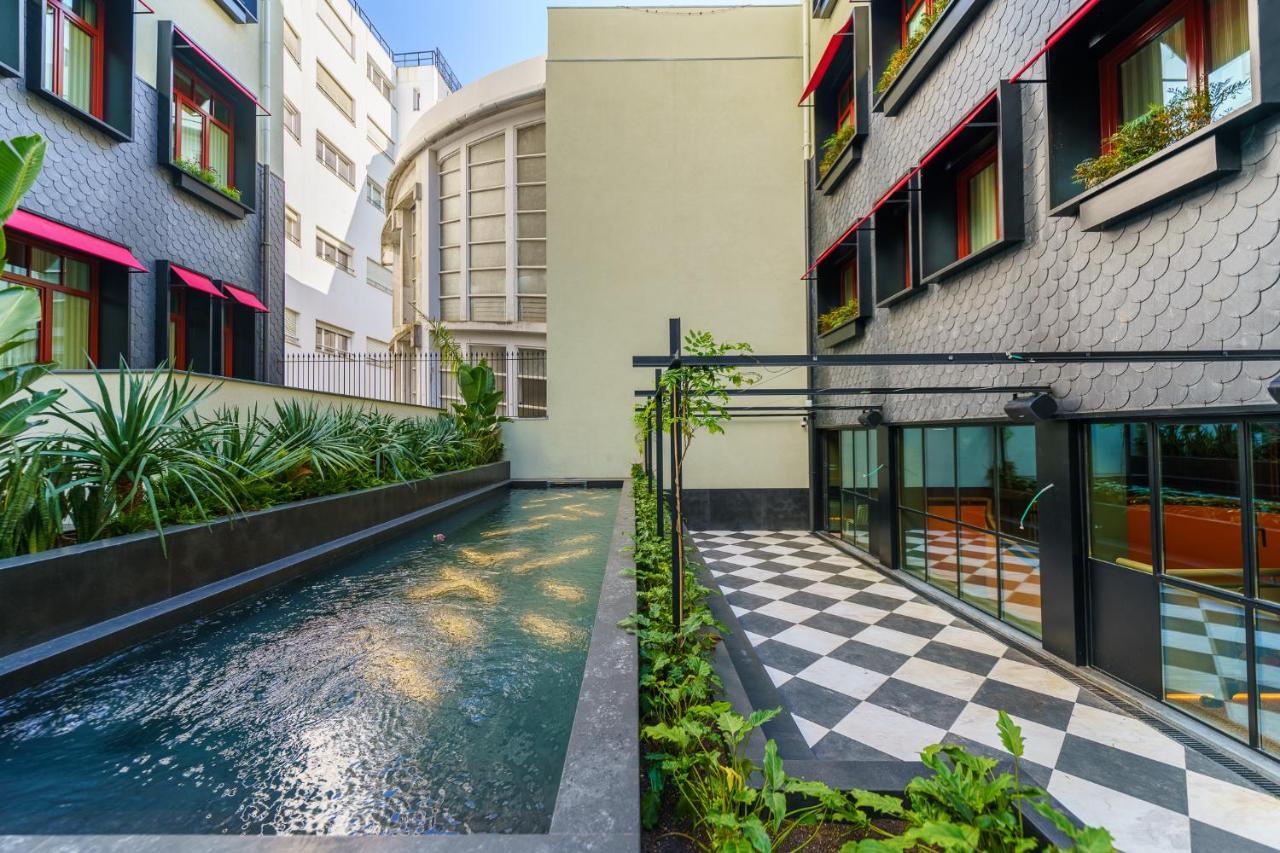 פורטו The Editory Boulevard Aliados Hotel - Preferred Hotels מראה חיצוני תמונה The hotel's courtyard