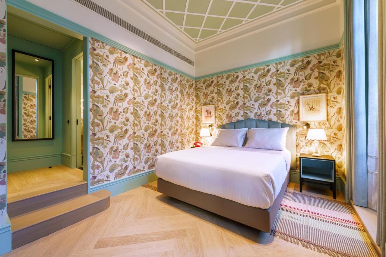פורטו The Editory Boulevard Aliados Hotel - Preferred Hotels מראה חיצוני תמונה A bedroom at the hotel