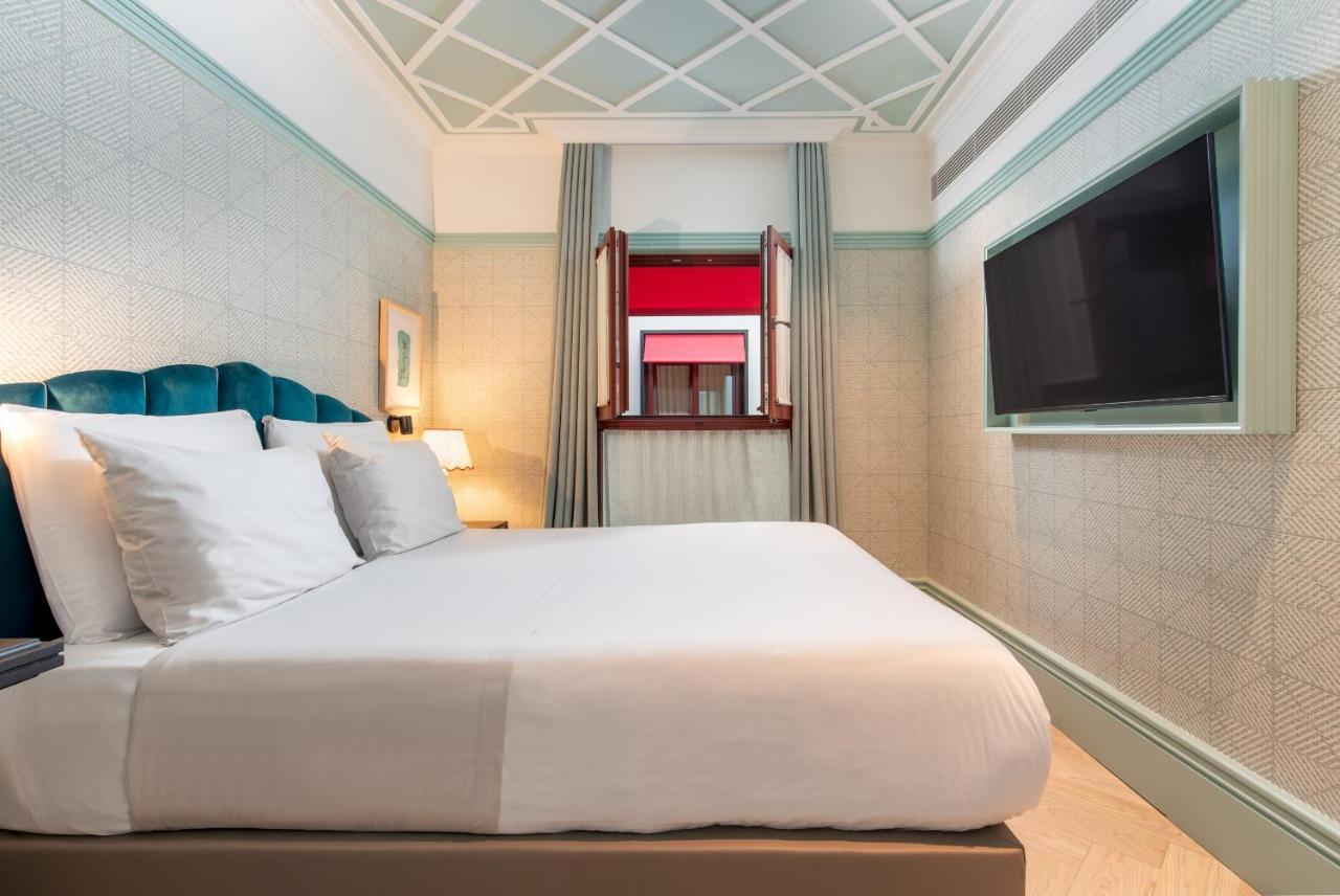 פורטו The Editory Boulevard Aliados Hotel - Preferred Hotels מראה חיצוני תמונה A room at the hotel
