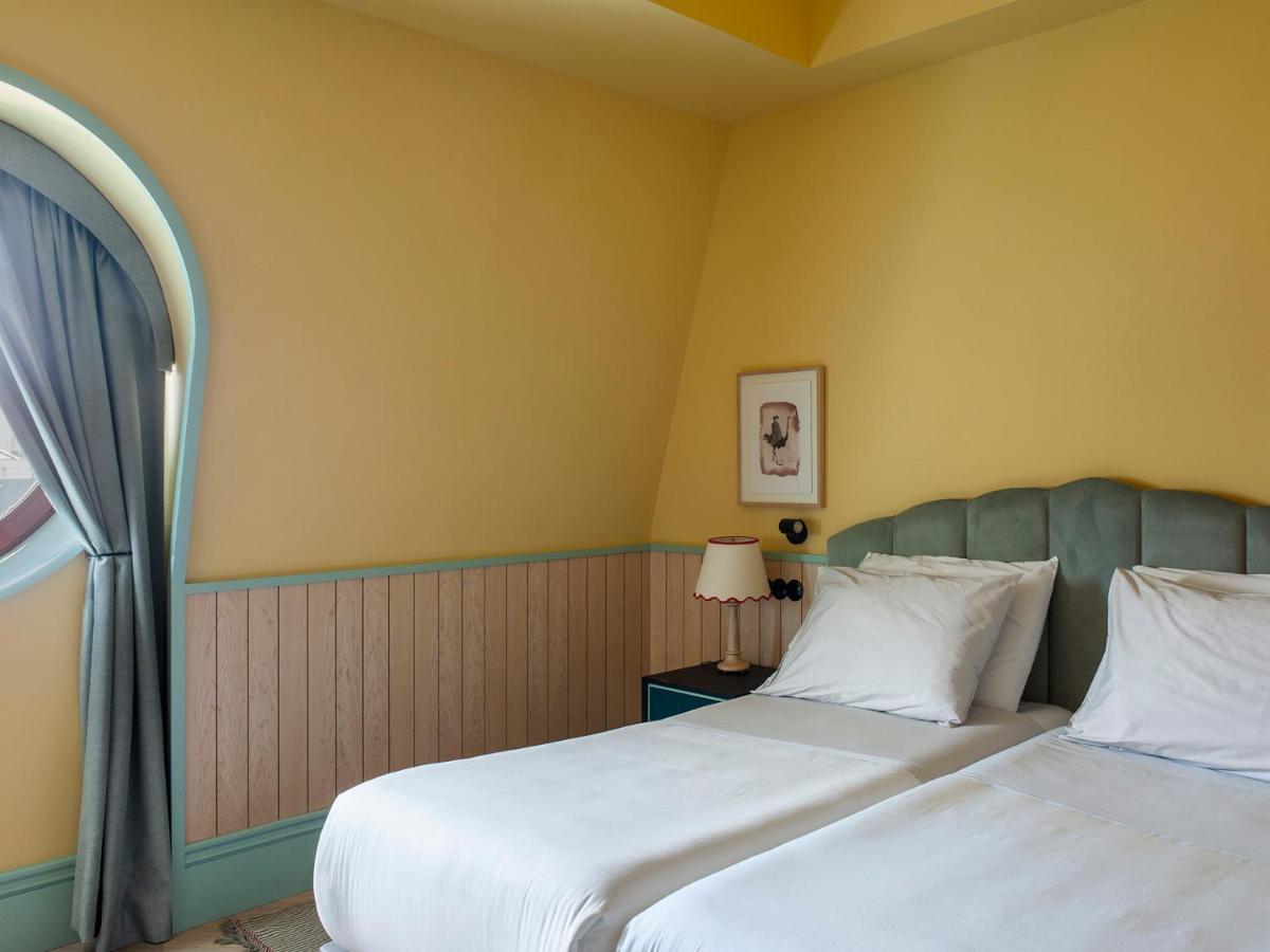 פורטו The Editory Boulevard Aliados Hotel - Preferred Hotels מראה חיצוני תמונה A room at the Hotel