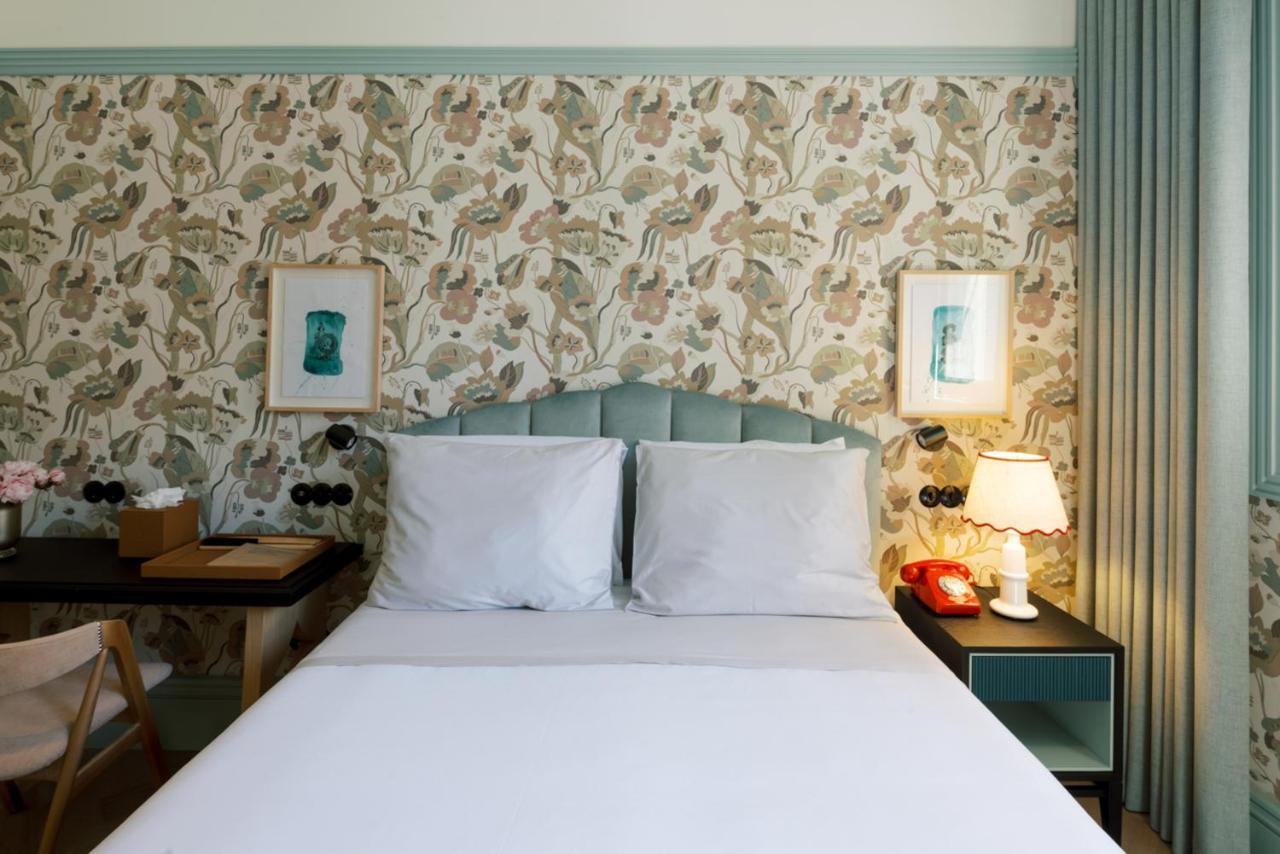 פורטו The Editory Boulevard Aliados Hotel - Preferred Hotels מראה חיצוני תמונה A bedroom at the Hotel