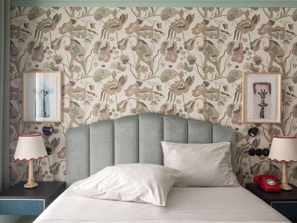פורטו The Editory Boulevard Aliados Hotel - Preferred Hotels חדר תמונה Wallpaper in a bedroom