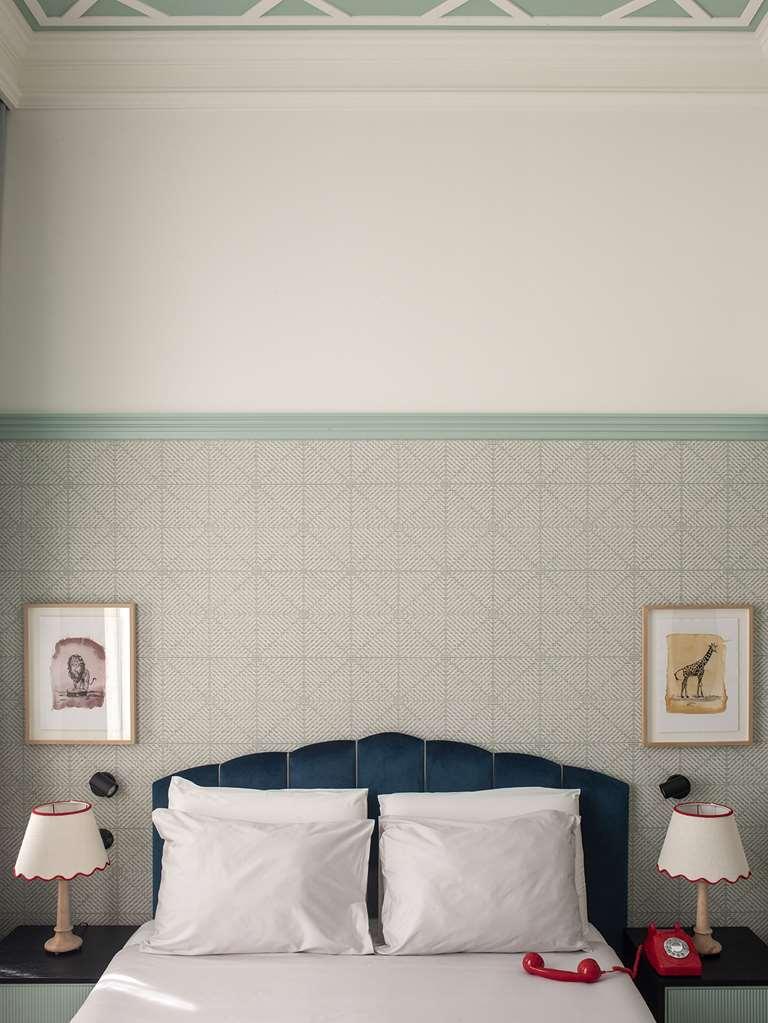 פורטו The Editory Boulevard Aliados Hotel - Preferred Hotels חדר תמונה A wall with a chair rail