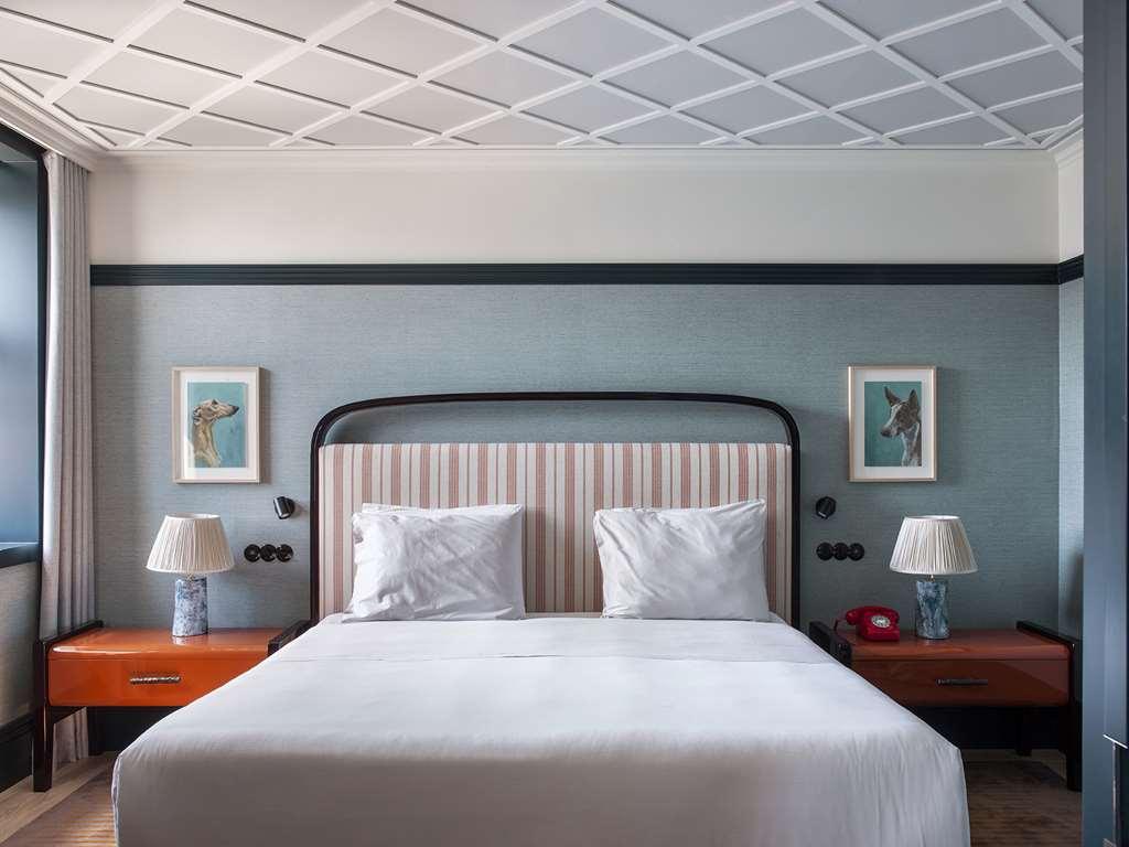 פורטו The Editory Boulevard Aliados Hotel - Preferred Hotels חדר תמונה A bedroom at the Hotel