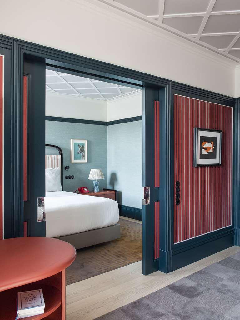 פורטו The Editory Boulevard Aliados Hotel - Preferred Hotels חדר תמונה A guest room at the Hotel Commonwealth